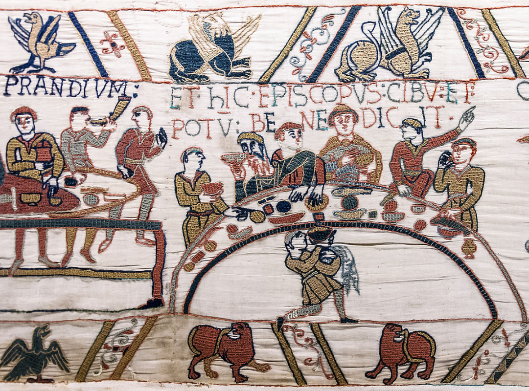 1200px-Bayeux_Tapestry_scene43_banquet.jpg